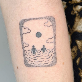 Stick and poke tattoo of two people in water looking at the sun and clouds