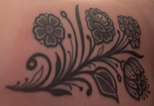 Black-work floral tattoo